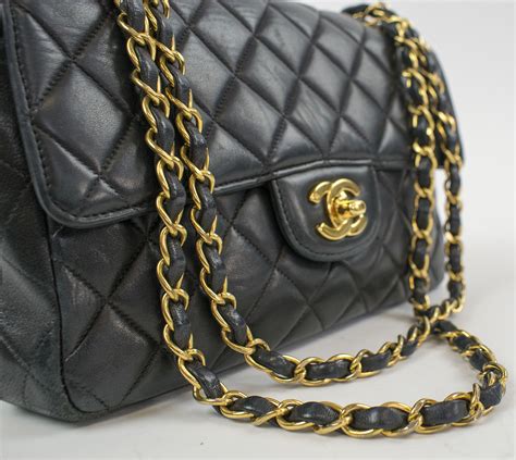 chanel black handbag chain strap.